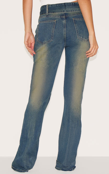 https://cdn-img.prettylittlething.com/d/9/7/d/d97d011b80feff89ce03affadeef73b1823b5e63_CNA3231_3_indigo_vintage_wash_belted_seam_front_flare_jeans.jpg