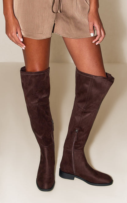 https://cdn-img.prettylittlething.com/e/5/3/8/e5386aee899253a8d31ccf1c044b1693d01ce4d3_CNN5169_2_chocolate_faux_suede_round_toe_riding_knee_high_boot.jpg