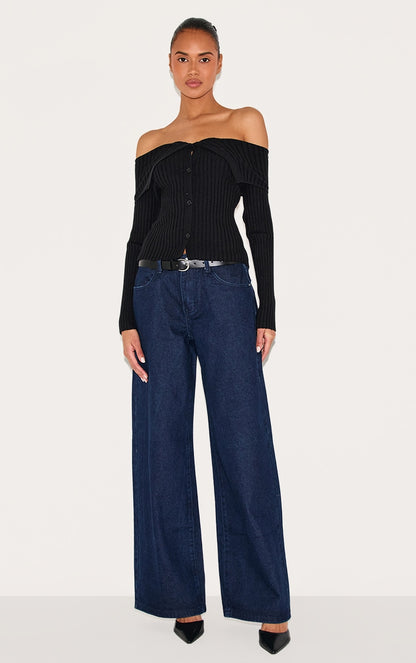 https://cdn-img.prettylittlething.com/e/5/5/8/e558260a7ec39102c840f3d3a2496f2a9846a5d0_CNL6064_3_black_rib_knit_fold_over_button_up_top.jpg