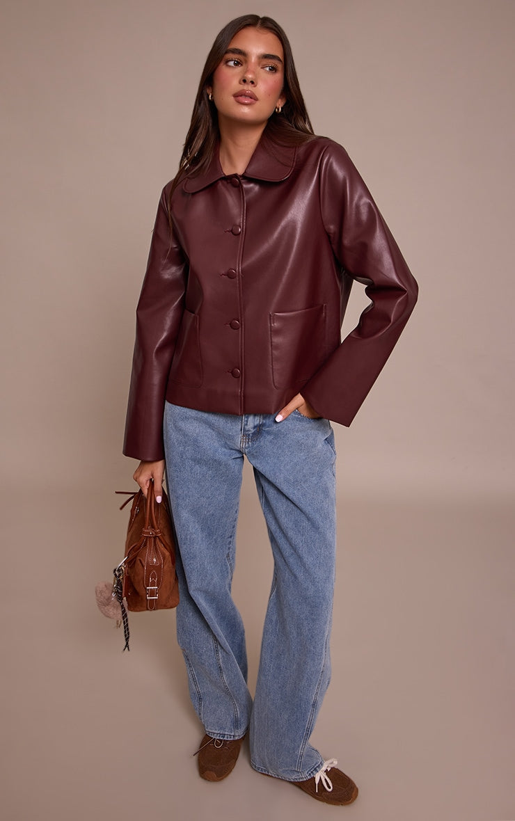 https://cdn-img.prettylittlething.com/e/7/a/c/e7ac4fb9bd8ccb1ba486ce597155f62e50faa768_CNN8424_3_burgundy_pu_button_up_jacket.jpg