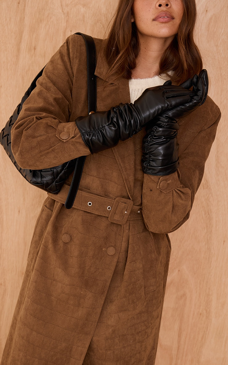 https://cdn-img.prettylittlething.com/f/2/c/b/f2cb8ff01473c34983d1cfc00d49f8ee9205df63_CNO1411_1_black_faux_leather_long_ruched_gloves.jpg