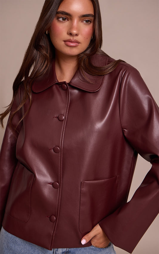 https://cdn-img.prettylittlething.com/f/c/2/e/fc2ec9e1c738bc67657d2e9d093655c8fcfcacb6_CNN8424_1_burgundy_pu_button_up_jacket.jpg