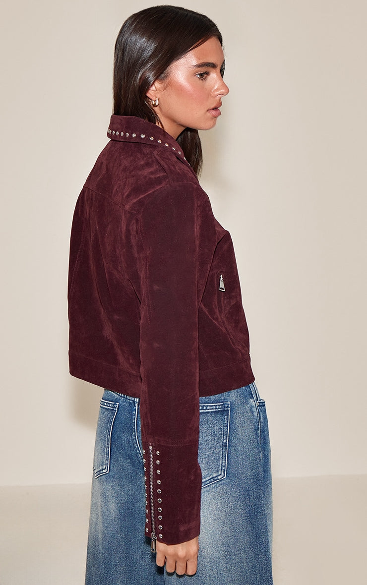 https://cdn-img.prettylittlething.com/f/c/a/9/fca9cfc9f066fbc7b586b55b0e8cc6afc9774071_CNN8420_2_burgundy_studded_detail_faux_suede_zip_up_jacket.jpg